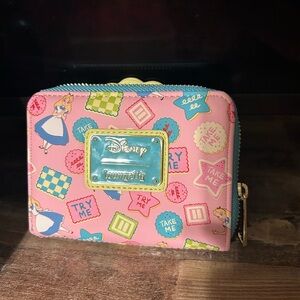 Loungefly Pink and Blue Bag with Playful Patterns